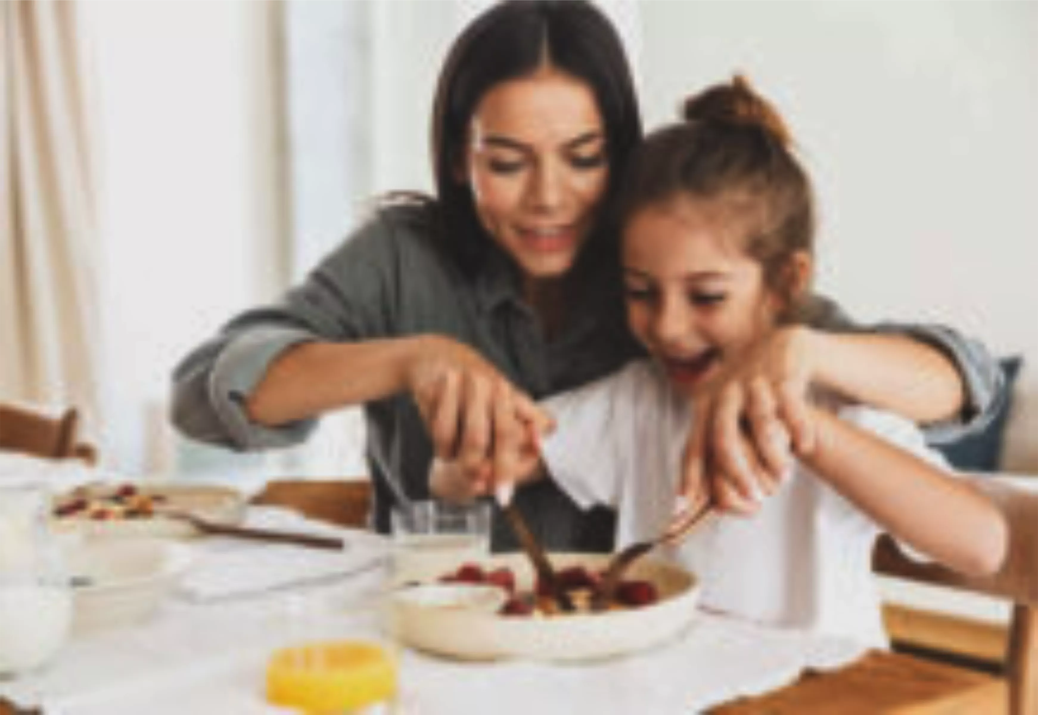 OZ -image of Woman feeding her daughter
